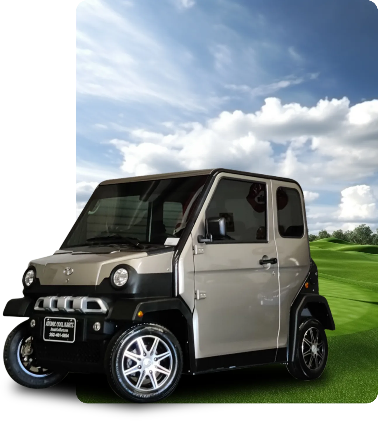 Atomic Coupe - White model on green landscape